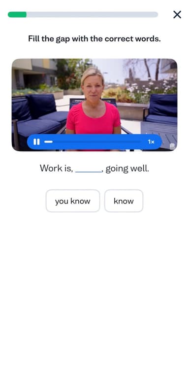Busuu video exercise where you fill the gap in a sentence from a short clip, language learning app interface